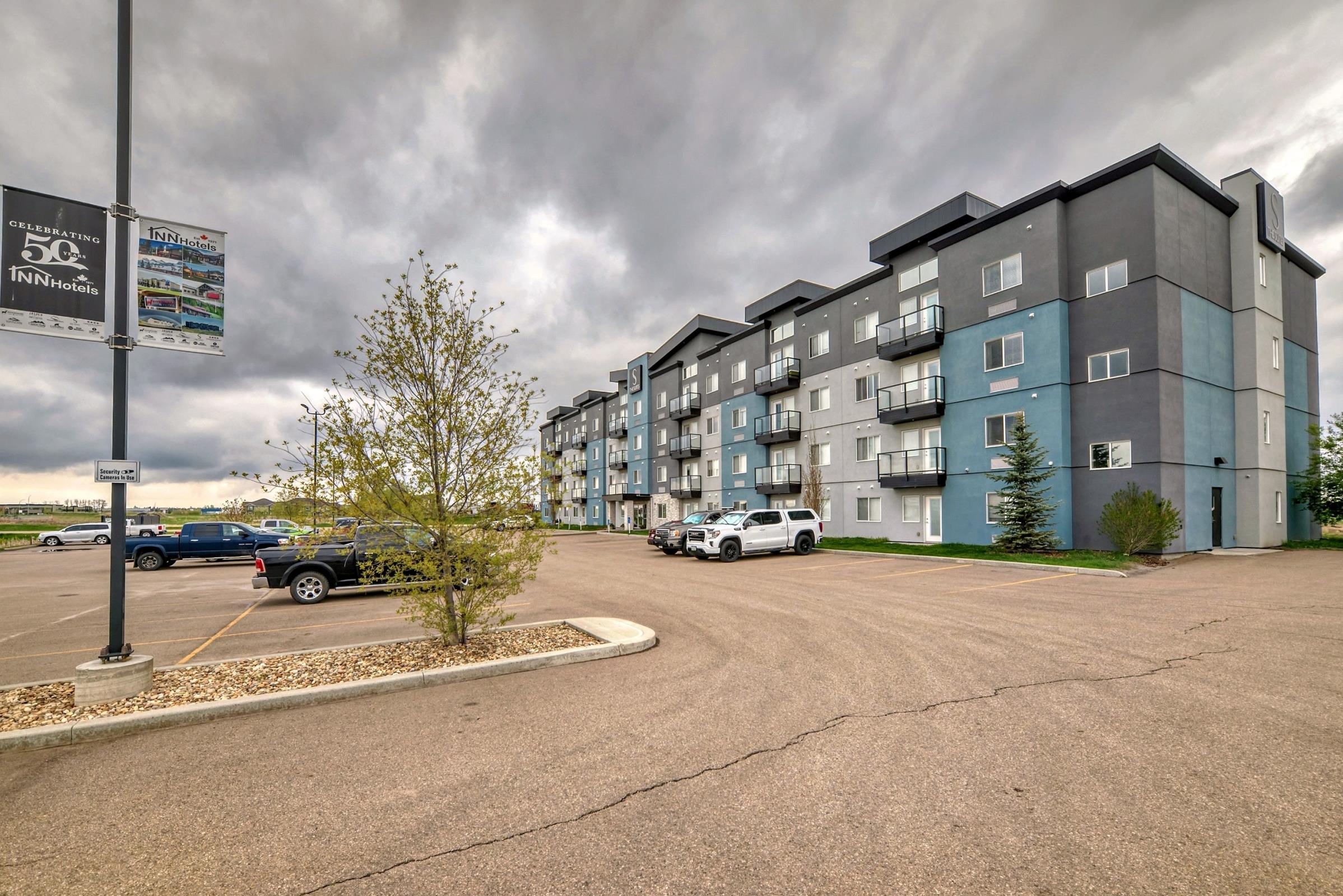 the suites at red deer, header background